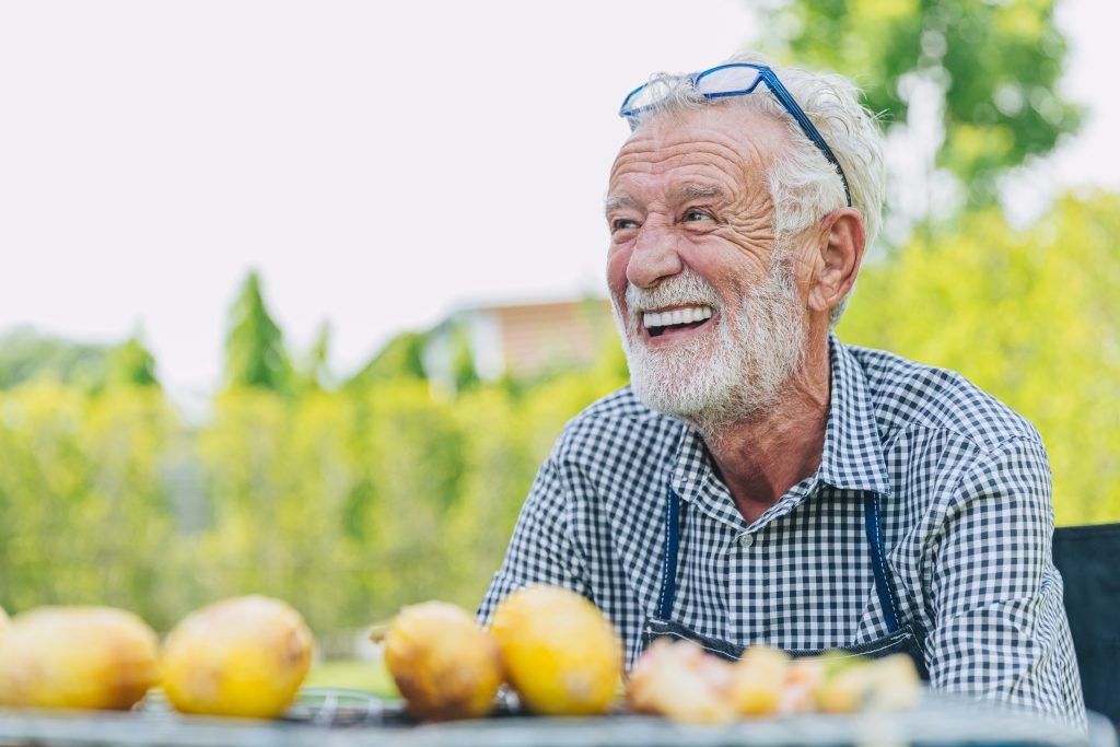 happy elderly man healthy senior confident smile at park outdoor Smile Restoration